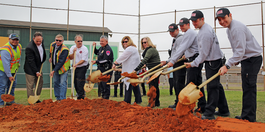 Portland firefighters and community leaders breaking ground on renovation of the municipal park and sports complex by Hellas Construction.