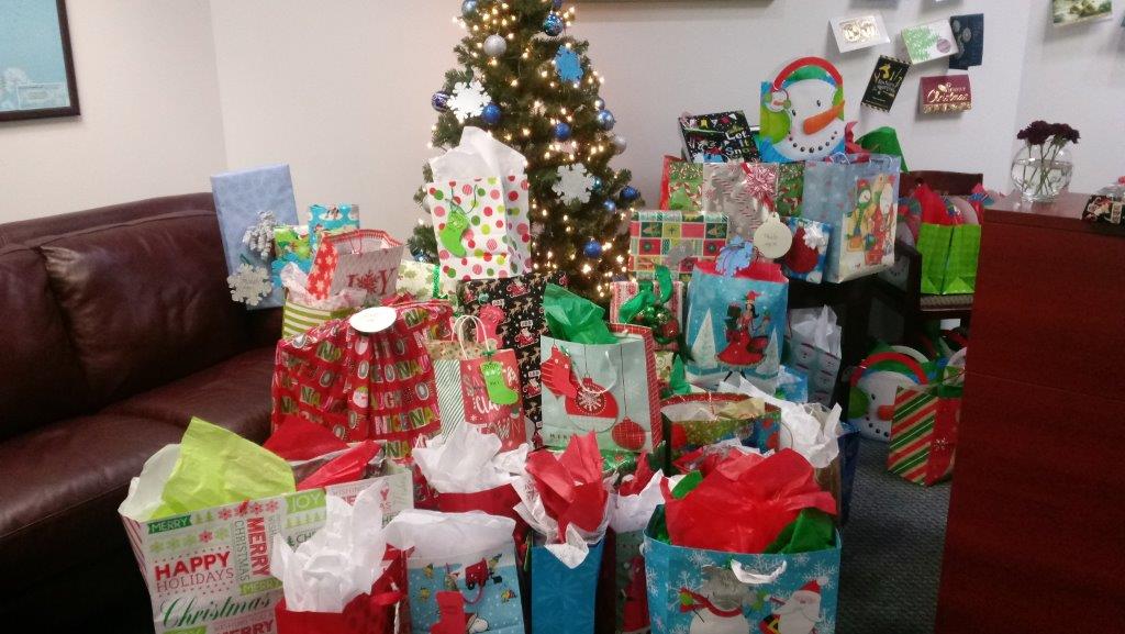 Gifts donated by Hellas employees for four Austin families through the Blue Santa Program