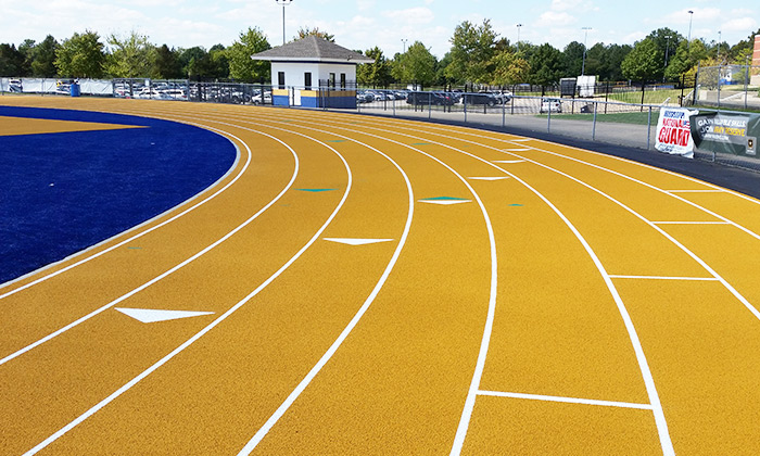 The special gold epiQ track S200 track was added to the special blue Matrix turf field both installed by Hellas.