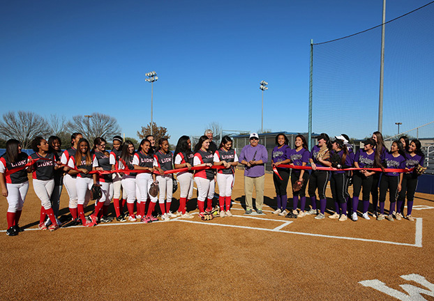 >Waco High School Lions and University High School Trojans at the ribbon-cutting