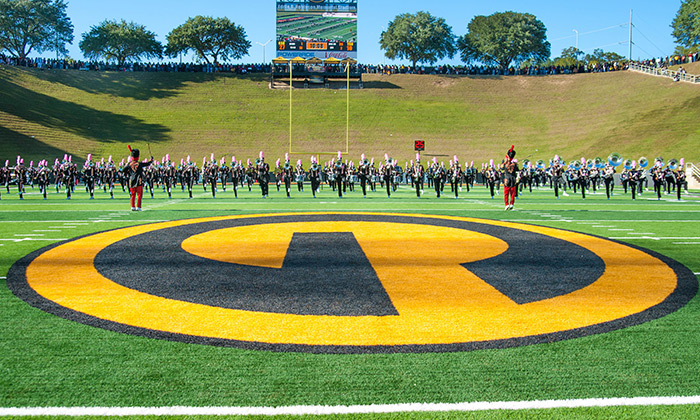 The Grambling Tiger Band marching on home field at Eddie G. Robinson Memorial Stadium on new Hellas Matrix Turf with Helix Technology from Hellas Construction.
